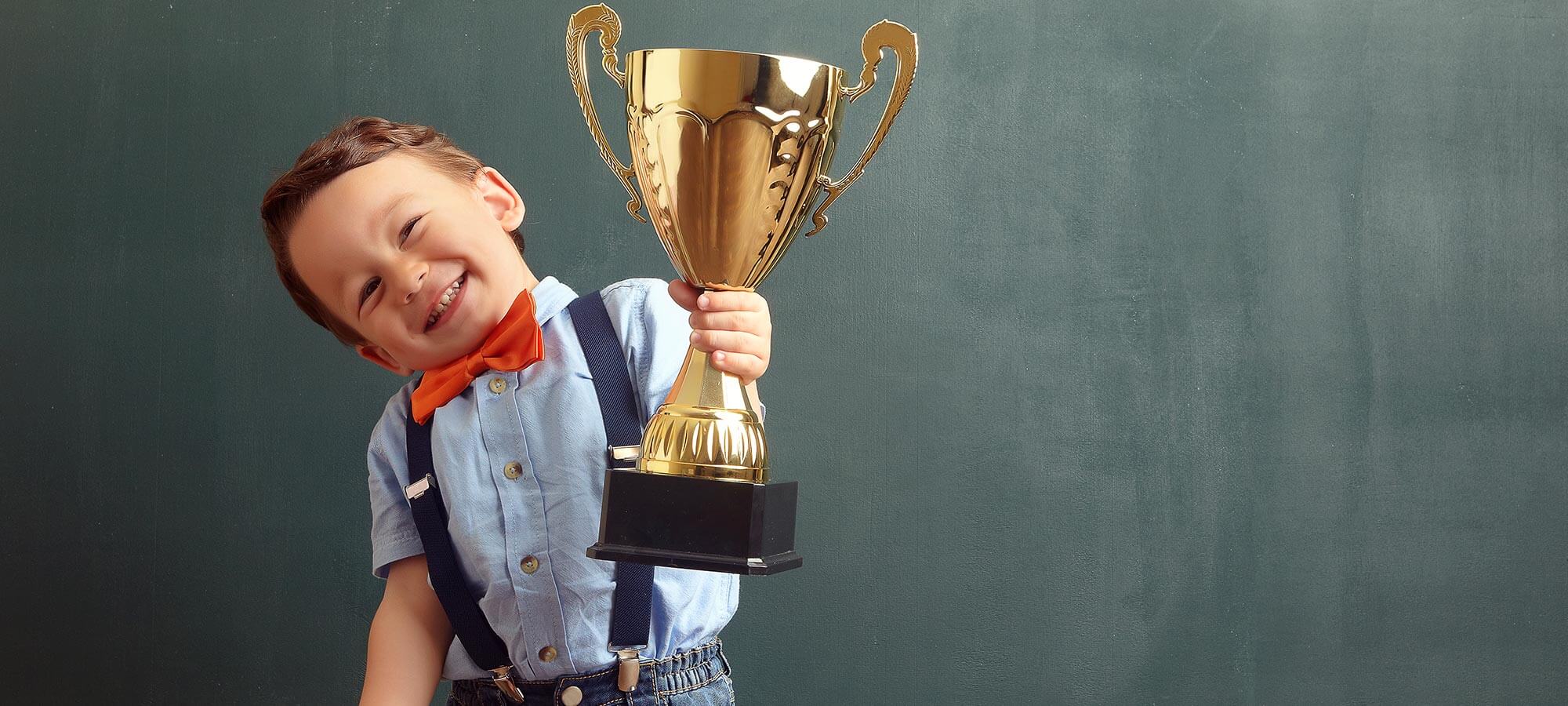 child-with-trophy